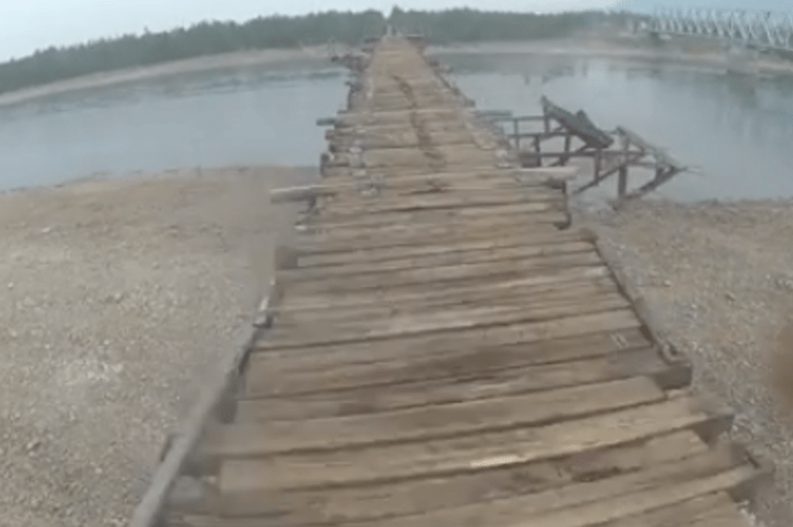 This Guy Has Taken Adventure Motorcycling A Different Level Crossing Vitim Bridge